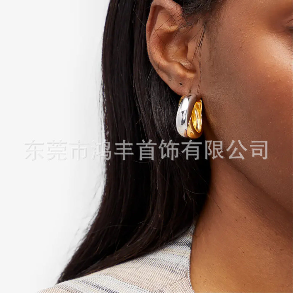 Medley Sculptural Gold and Silver Dual Toned Huggie Hoops